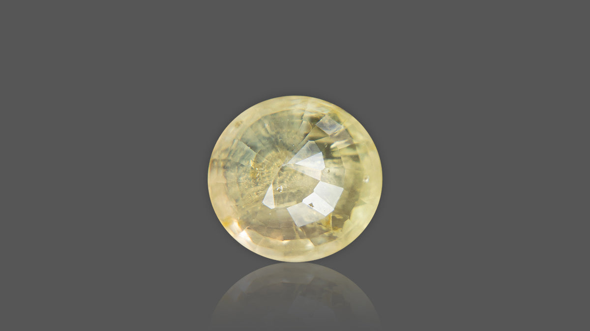 Buy Natural Ceylon (Sri Lanka) Yellow Sapphire weighing 8.69 Carat at Best Price